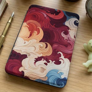 May include: A set of three ceramic mugs with a speckled, matte finish. The mugs are in shades of cream, light gray, and dark gray. Each mug has a simple, minimalist design, perfect for coffee or tea.