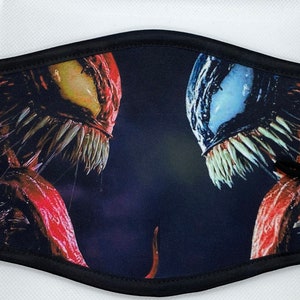 May include: Black face mask with a graphic print of two Venom characters, one red and one blue, with sharp teeth and tongues.