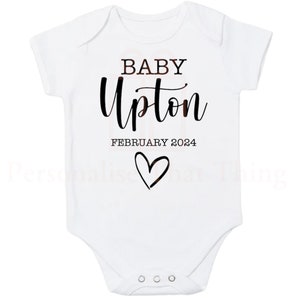 Personalised name and date with heart pregnancy announcement baby onesie