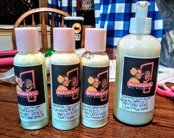 May include: Four bottles of body care products with pink lids and black labels. The labels feature a logo with two people and the text "Hillman's One Stop Shop". The bottles are labeled with product names like "Peppermint" and "Eucalyptus".