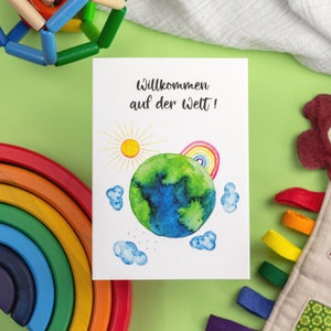 Glückwunschkarte zur Geburt | Willkommen auf der Welt | Karte zur Geburt in Aquarell mit Regenbogen