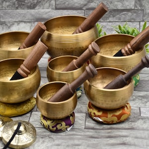 Hand beaten singing bowl set of 7 - Seven Tibetan singing with mallet cushion and tigsha cymbals as a gift - Chakra Bowls