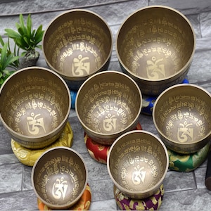 7 Chakra Healing Mantra carved singing bowl set of seven - Himalayan Sound Healing Meditation Bowls -mallet cushion - yoga mindfulness bowls