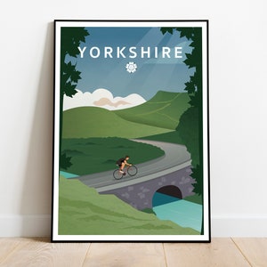 May include: A colourful illustration of a cyclist riding on a road through a green valley with the text "YORKSHIRE" at the top of the image.