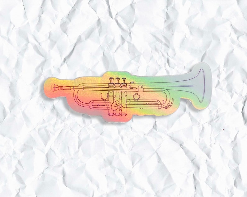May include: A rainbow holographic sticker of a trumpet. The trumpet is outlined in black and has a silver bell.