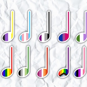 May include: Ten musical note stickers with different pride flag designs. The flags include the transgender, bisexual, lesbian, pansexual, genderqueer, asexual, non-binary, intersex, and progress pride flags.