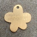 Premium Thick Flower Shaped Dog Tag - Hand Stamped Brass Metal product logo
