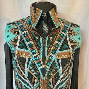 May include: A black show shirt with a turquoise, brown, gold, and green geometric pattern. The shirt has a zip fastening and long sleeves with matching cuffs.