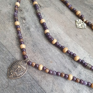 Viking brooch chain- mask amulet from Gotland with amethysts