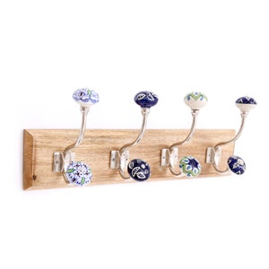 Wooden coat rack with ceramic