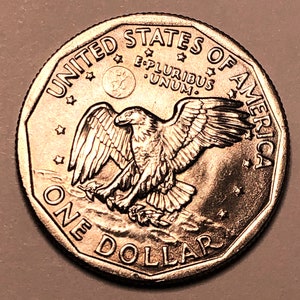 1979 unique Susan B Anthony dollar with wide rim in uncirculated condition. image 2