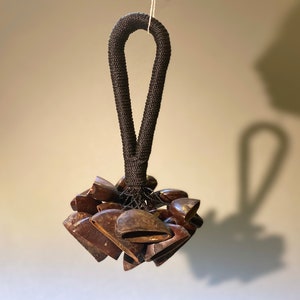 Entada seed handshaker. For pagan rituals and dances.