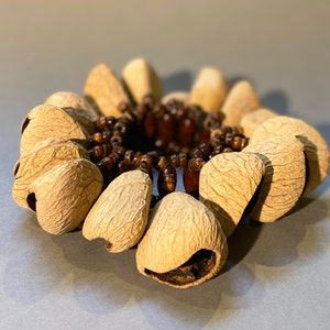 Pangi seed bracelet. A gift for followers of the pagan dance rituals.