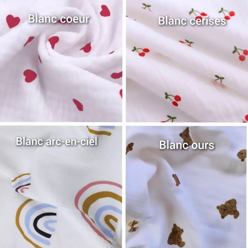 May include: Four white fabric squares with different patterns. The top left square has red hearts, the top right square has red cherries, the bottom left square has rainbow patterns, and the bottom right square has brown teddy bears.