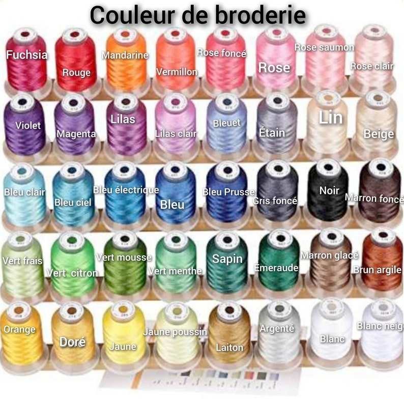 May include: A collection of spools of embroidery thread in various colors, including fuchsia, violet, blue, green, orange, yellow, and white. The spools are arranged in rows on a wooden rack. The text "Couleur de broderie" is visible at the top of the image.