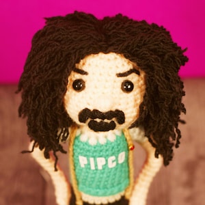 May include: A set of three ceramic vases in varying heights and shapes. The vases are glazed in a matte white finish, offering a minimalist aesthetic. The tallest vase is approximately 10 inches high.