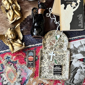 Vintage mystery box in an antique feminine light academia decor style.
