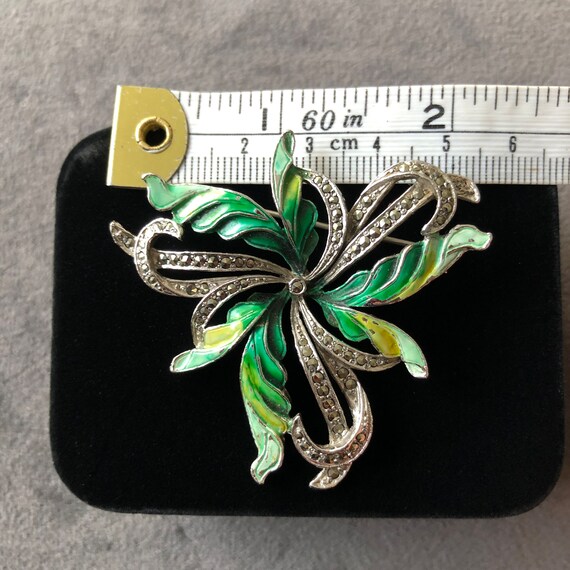 A beautiful vintage green floral enamel and marca… - image 9