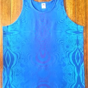 May include: A blue sleeveless shirt with a psychedelic pattern. The pattern is a swirling mix of blue, purple, and white.