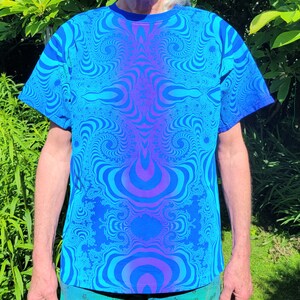 May include: A blue and purple t-shirt with a swirling, psychedelic pattern.
