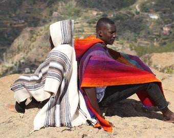 Hand Woven Warm Soft Woolen Hooded Ecuadorian Ponchos Ethically Made Perfect for Cold Nights Festival Camping. Bright and Colourful Tones