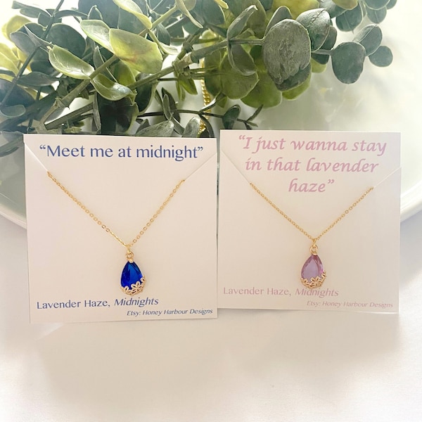 purple or deep blue glass teardrop shape pendant necklace, teardrop pendant with flower encasing