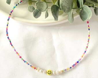 rainbow seed bead choker necklace with yellow smiley and freshwater pearls