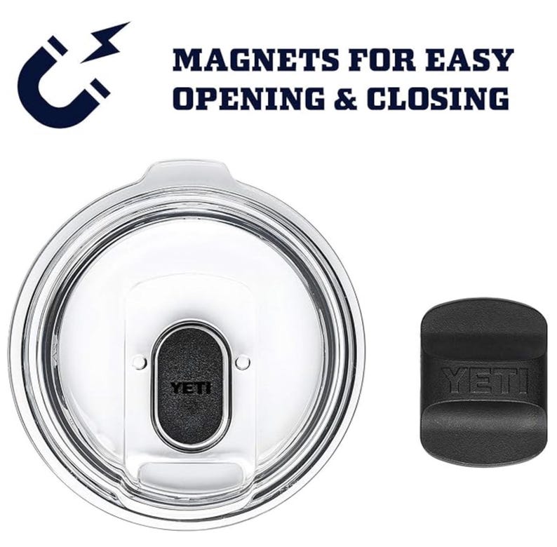 May include: Clear plastic tumbler lid with a black magnetic slider and a separate black magnetic piece. The lid has the word "YETI" printed on the slider. Text above the lid reads "MAGNETS FOR EASY OPENING & CLOSING."