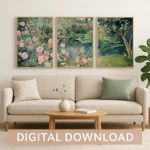 May include: Three framed art prints with a floral theme, rendered in an impressionistic style. The artwork depicts pink roses, water lilies, and verdant foliage. The prints are displayed above a beige sofa with a round wooden coffee table. Text at the bottom reads "DIGITAL DOWNLOAD".