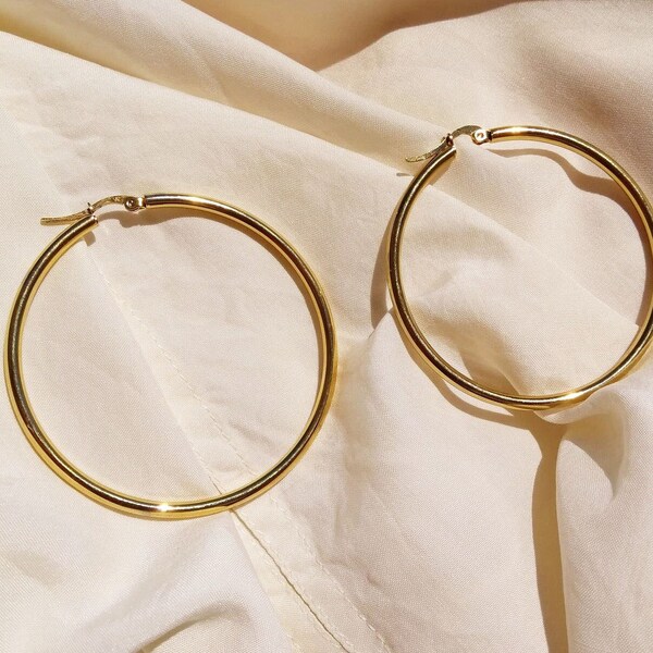 Big plastic earrings clearance