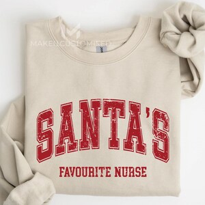 Comfort Colors® Santa's Favourite Nurse Christmas Shirt, Funny Nurse Holiday Sweatshirt, CR81