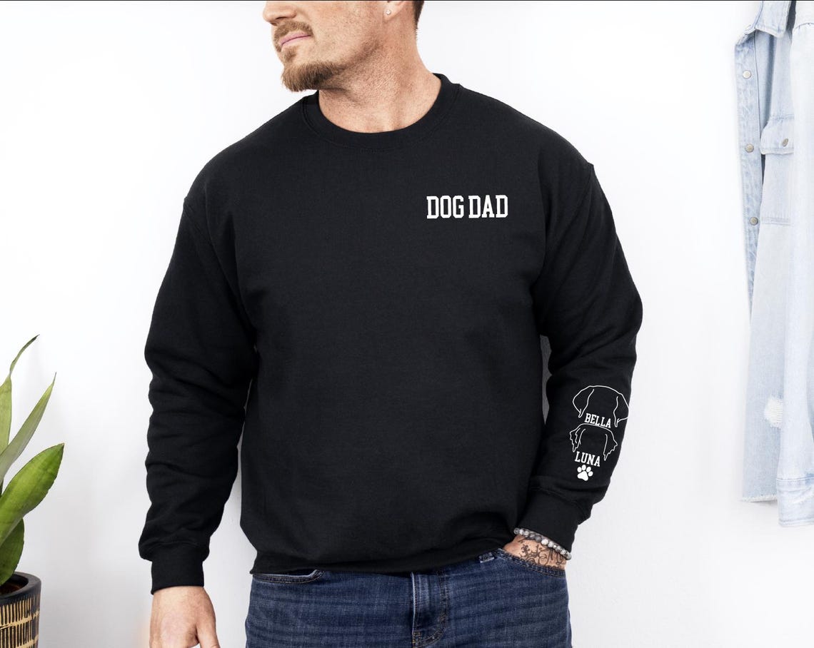 Personalized dog ear and name dog dad sweatshirt in black.