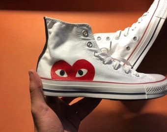 black and white converse with red heart