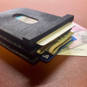 Cartera delgada minimalista: material único, flexible e impreso en 3D