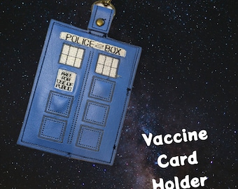 Space Dr. vaccination card protector. Space for valuables. Attach to purse, bag, backback or beltloops Vinyl, cork, leather.