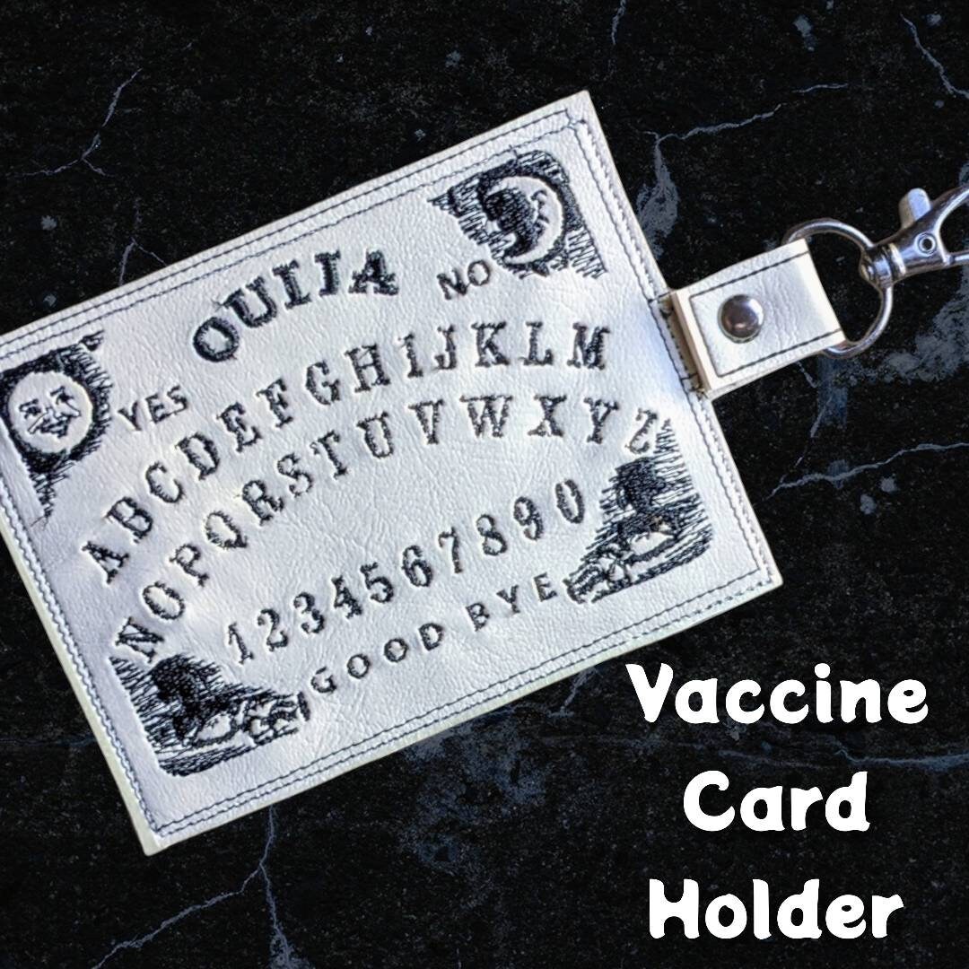 Ouija board vaccination card protector. Space for valuebles. Attach t…