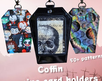 Coffin vaccination card protector. Space for valuables. Attach to purse, bag, backback or beltloops Vinyl, cork, leather.