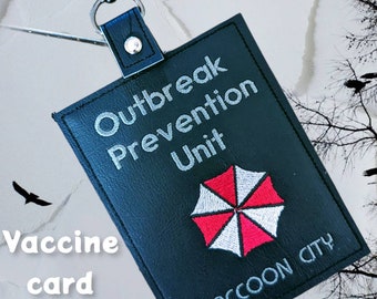 Zombie outbreak badge/ vaccination card protector. Space for valuables. Attach to purse, bag, backback or beltloops