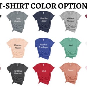 May include: A selection of t-shirt colors, including black, deep heather, heather navy, athletic heather, heather raspberry, heather mauve, heather peach, heather true royal, teal, white, maroon, dark grey heather, red, sunset, and pink.