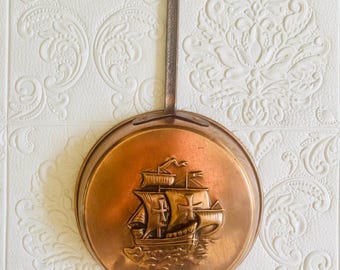 Vintage koperen bakvorm met bootdecor