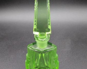 Vintage groen glazen art-decoparfumflesje