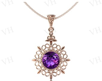 May include: A delicate gold necklace with a pendant featuring a large, round, purple amethyst gemstone set in a filigree design.