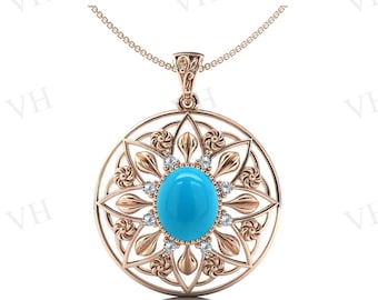 May include: A gold pendant necklace with a turquoise stone surrounded by diamonds in a circular design.