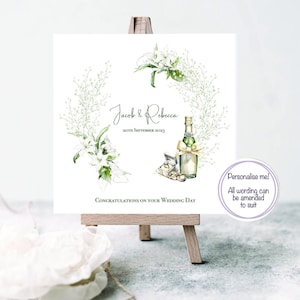 Personalisierte Lilienkranz Hochzeitskarte, Champagner, Ringe Glückskarte, Feierkarte mit Champagner, Eheringe Glückwunschkarte