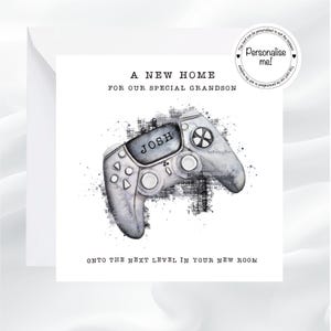 May include: A white greeting card with the text "A NEW HOME FOR OUR SPECIAL GRANDSON" and "ONTO THE NEXT LEVEL IN YOUR NEW ROOM". The card features a watercolor-style image of a gray video game controller with the name "JOSH" on it.