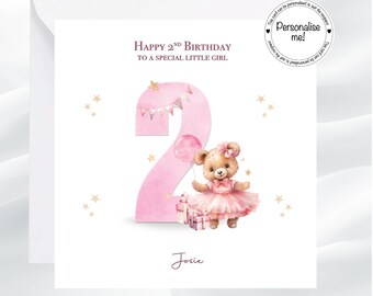 May include: A square birthday greeting card featuring a large pink number two, a teddy bear in a pink tutu holding a balloon, and gift boxes. The text reads Happy 2nd Birthday to a special little girl, Josie, and a circular badge says Personalise me!