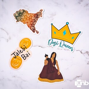 May include: Four colourful stickers with a South Asian theme. The stickers feature a mandala design, a crown with the text "Desi Queen", a jalebi sweet, and a woman wearing a traditional outfit.
