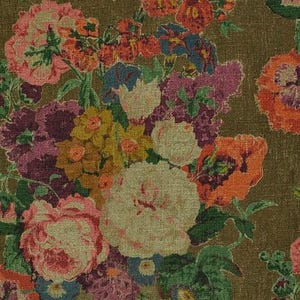 May include: Close-up of a fabric with a floral pattern. The design features a variety of flowers in shades of pink, orange, purple, yellow, and blue, set against a brown background. The flowers are densely packed, creating a rich, textured appearance.