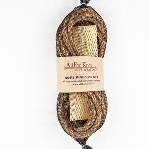May include: A brown rope wreath kit in a black mesh bag with a brown paper label that reads "All For Knot Rope Weaving "Connect with the Sea" Rope Wreath Kit All rope and detailed instructions included. www.allforknot.ca"