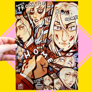 May include: A print with a comic-style illustration. The artwork shows a person with blonde hair and blue eyes, with text fragments like "Annie, Promise Me You'll Come Home" and "Treat the whole world as your enemy." The image has a stained glass effect.